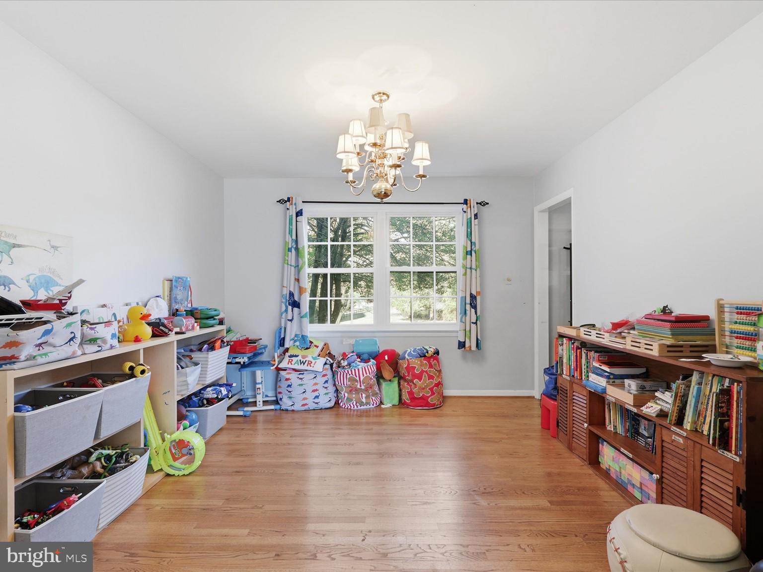 11130 Chapel Road Fairfax Station, VA 22039 - Photo 13 of 55 a living room with lots of furniture and a wooden floor