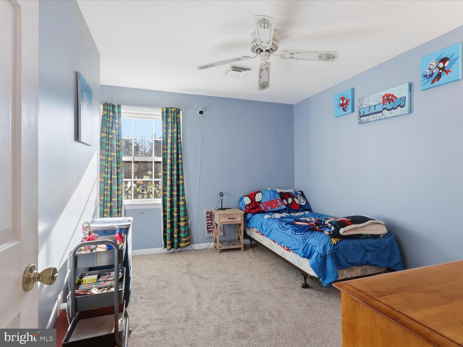 11130 Chapel Road Fairfax Station, VA 22039 - Photo 18 of 55 a bedroom with furniture and a window
