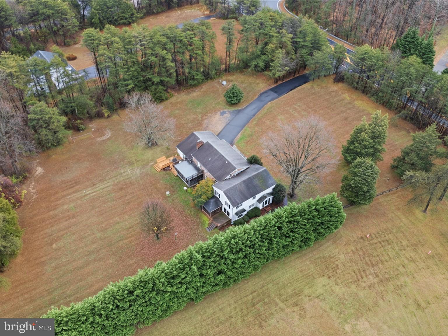 11130 Chapel Road Fairfax Station, VA 22039 - Photo 21 of 55 an aerial view of a house with garden space and street view