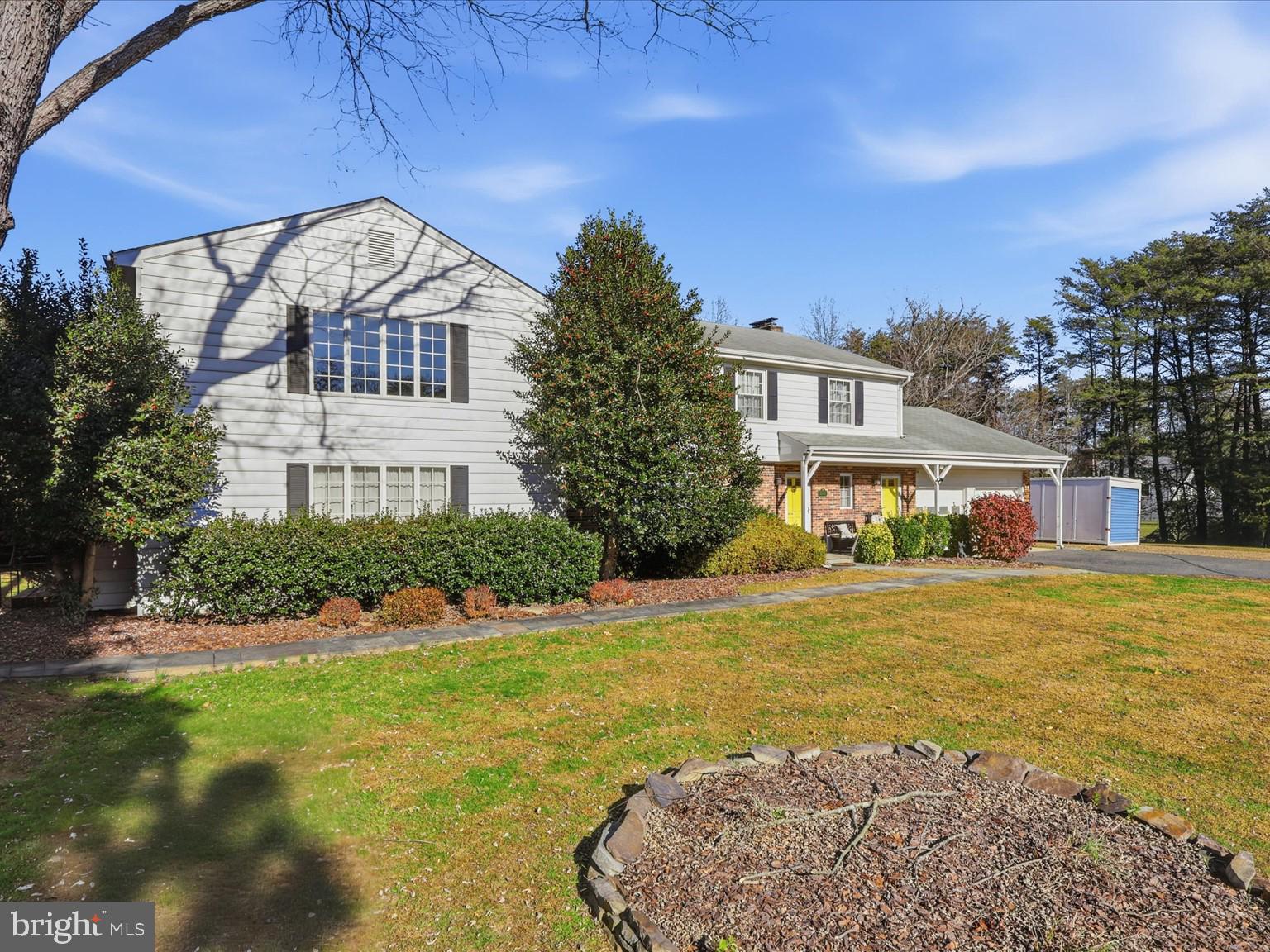 11130 Chapel Road Fairfax Station, VA 22039 - Photo 23 of 55 a front view of a house with a yard