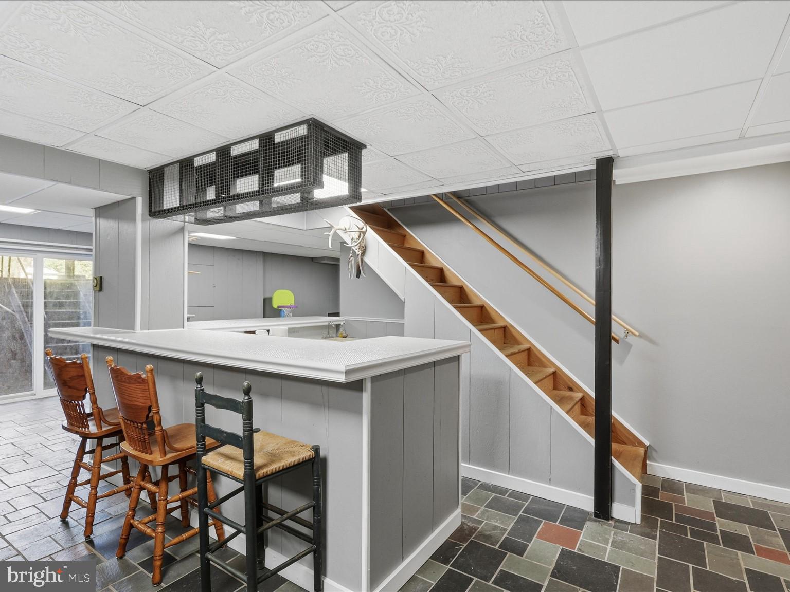 11130 Chapel Road Fairfax Station, VA 22039 - Photo 34 of 55 a view of a dining room with furniture and a chandelier