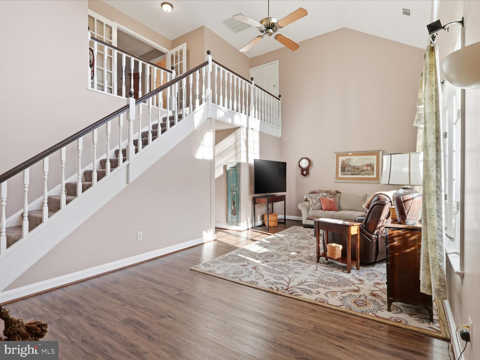 11130 Chapel Road Fairfax Station, VA 22039 - Photo 40 of 55 a view of a livingroom with wooden floor and furniture