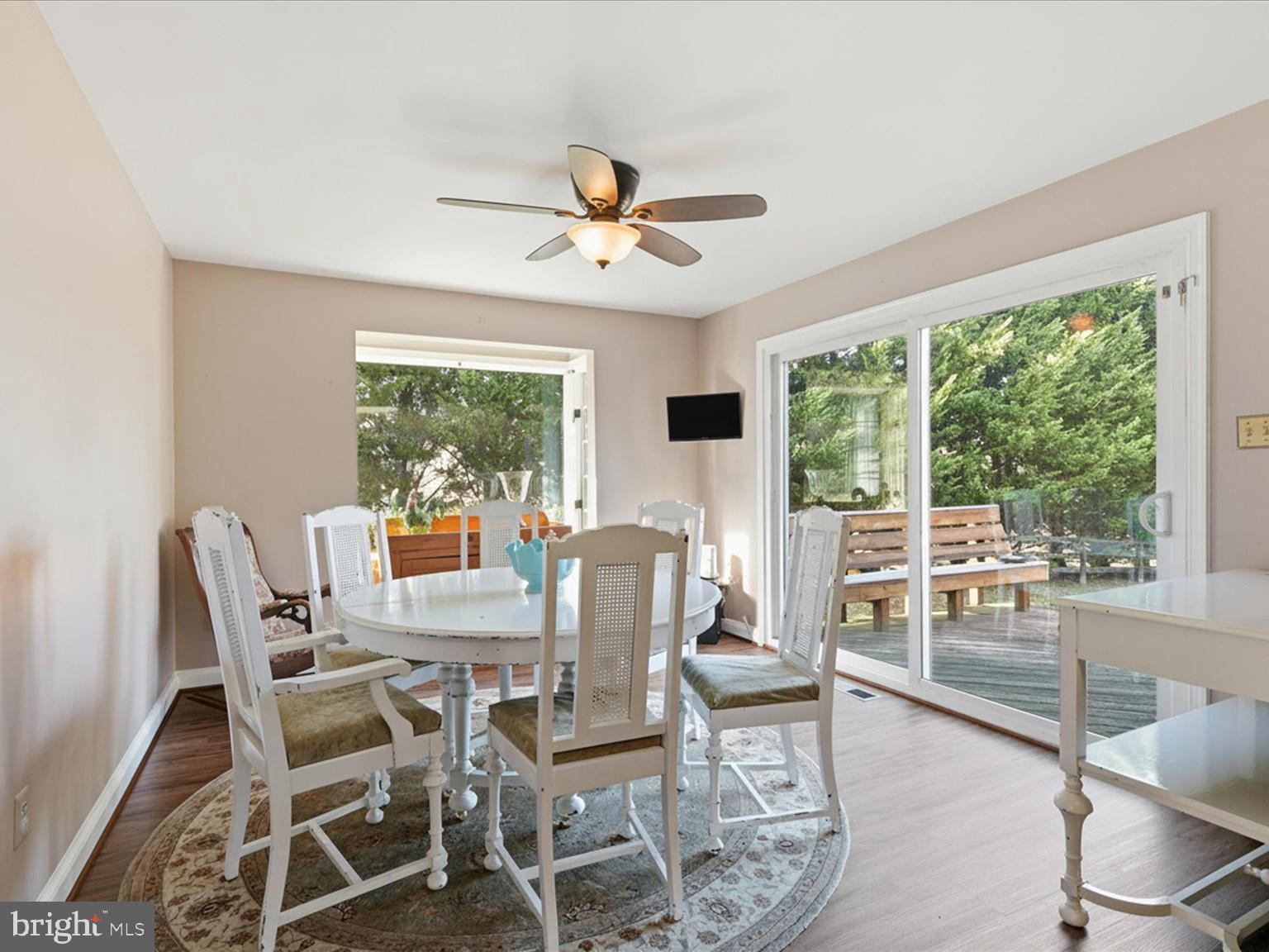 11130 Chapel Road Fairfax Station, VA 22039 - Photo 43 of 55 a view of a dining room with furniture window and outside view