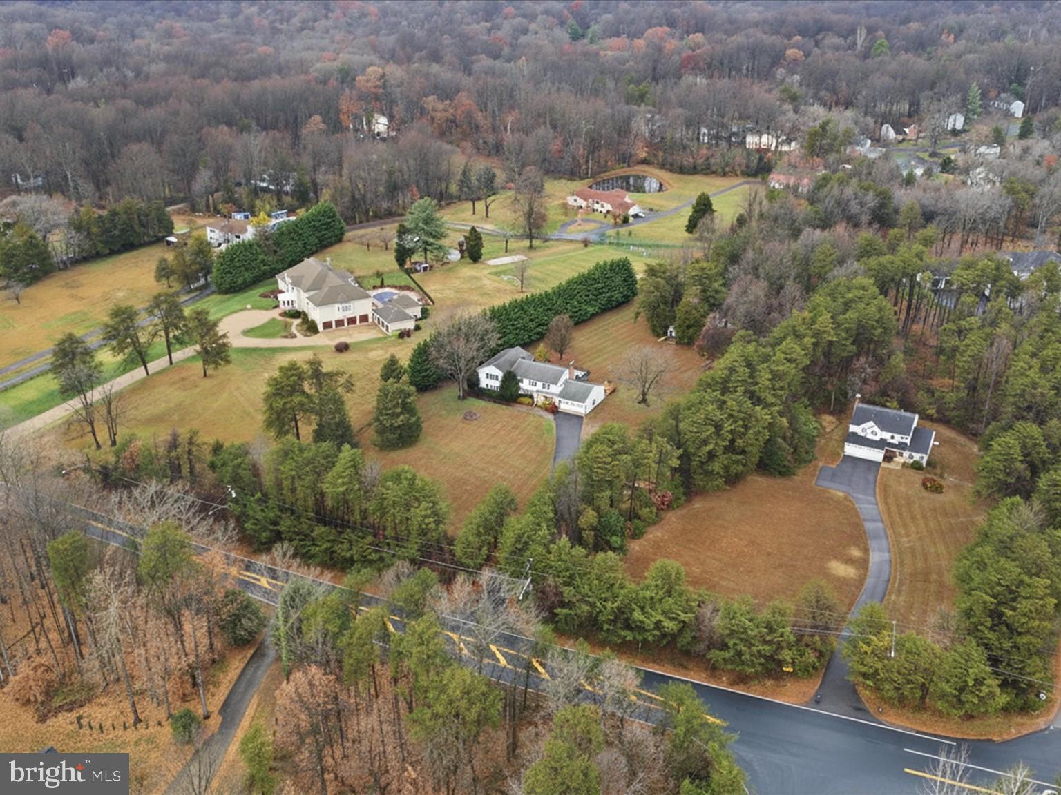 11130 Chapel Road Fairfax Station, VA 22039 - Photo 50 of 55 an aerial view of a house with a yard