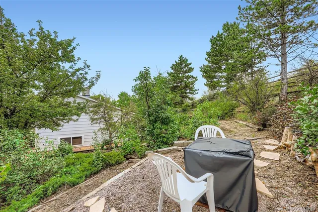 a view of a patio in backyard