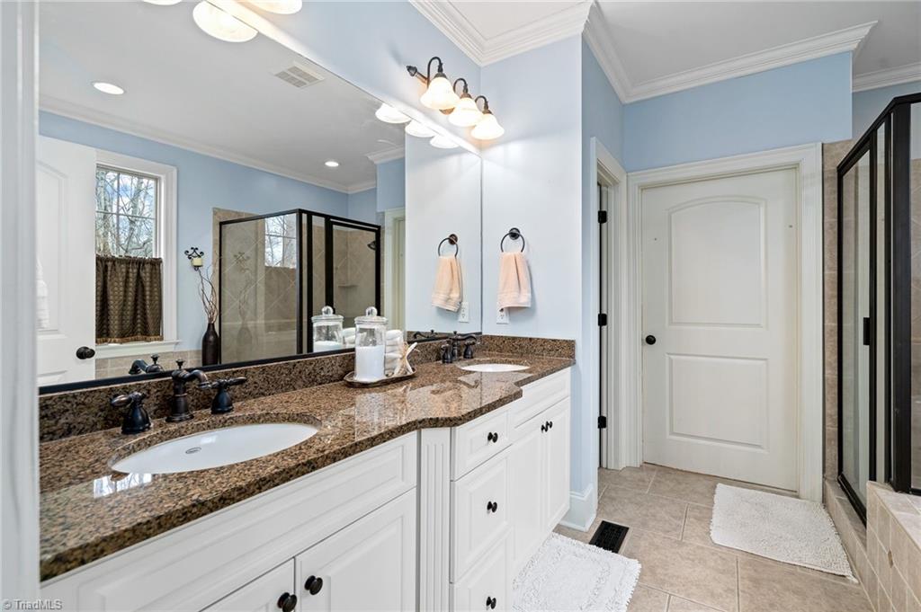 5005 Robdot Drive Oak Ridge, NC 27310 - Photo 17 of 50 Primary bath