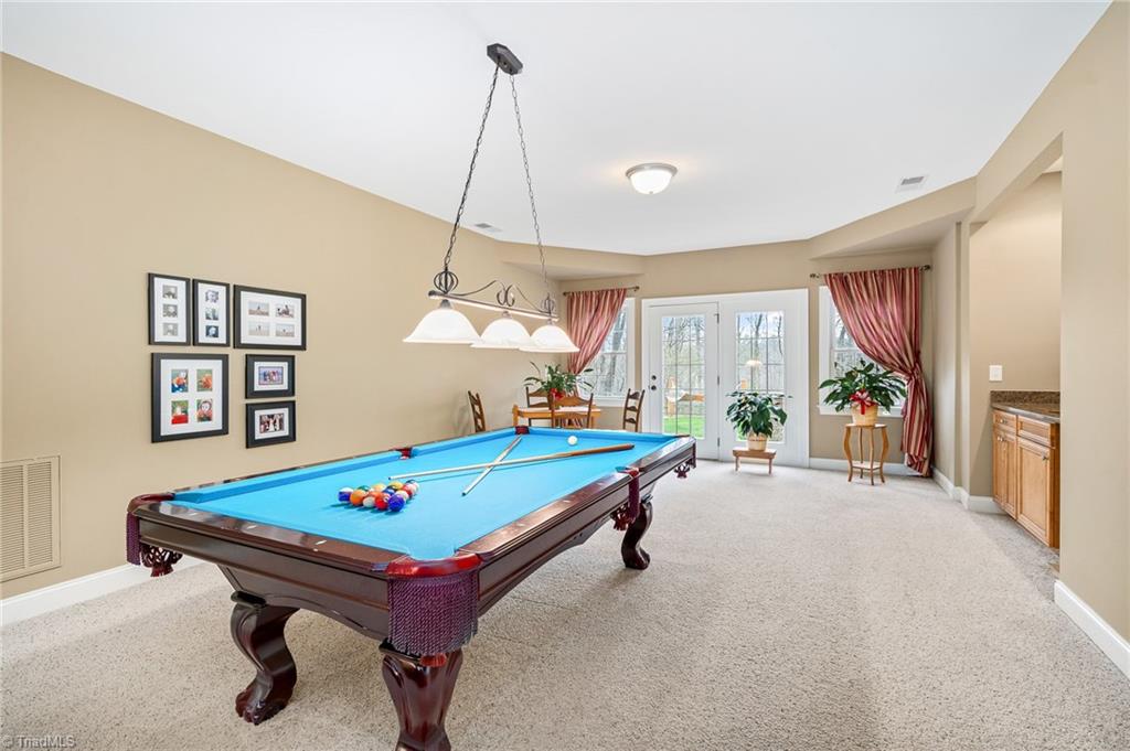 5005 Robdot Drive Oak Ridge, NC 27310 - Photo 40 of 50 Basement Rec Room