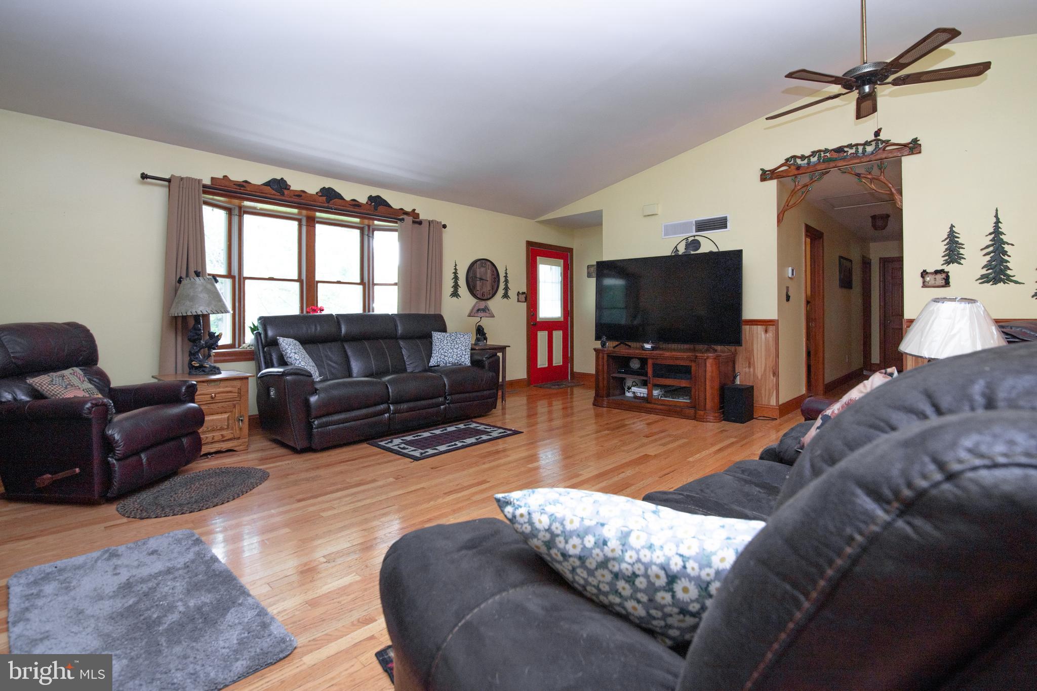 306 East Red Hill Road Conowingo, MD 21918 - Photo 13 of 27 a living room with furniture and a flat screen tv