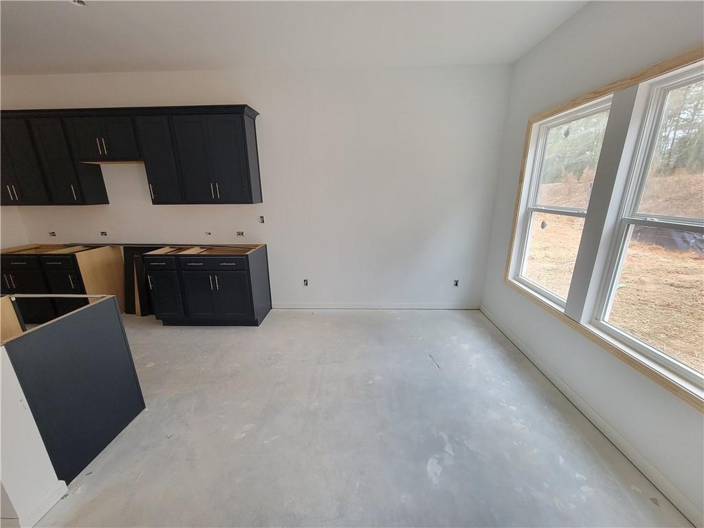 280 Silverleaf Trail Bethlehem, GA 30620 - Photo 7 of 25 a view of kitchen with window and cabinets