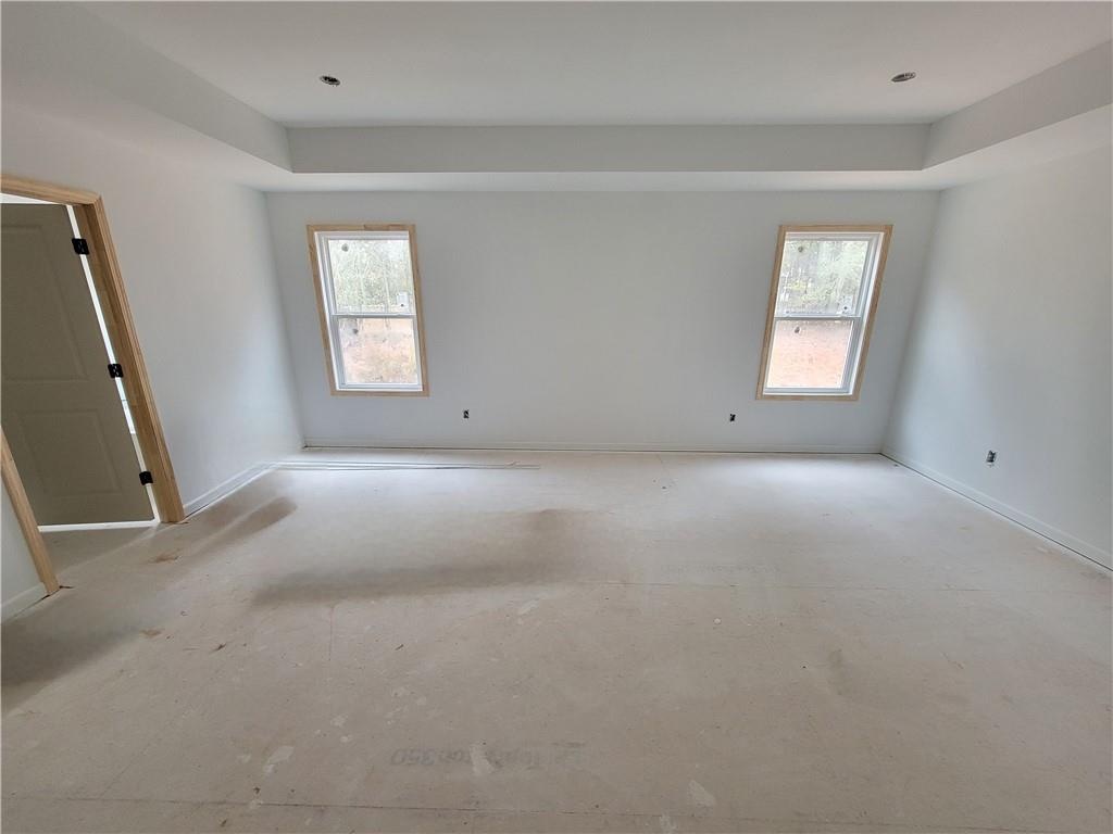 280 Silverleaf Trail Bethlehem, GA 30620 - Photo 9 of 25 an empty room with windows
