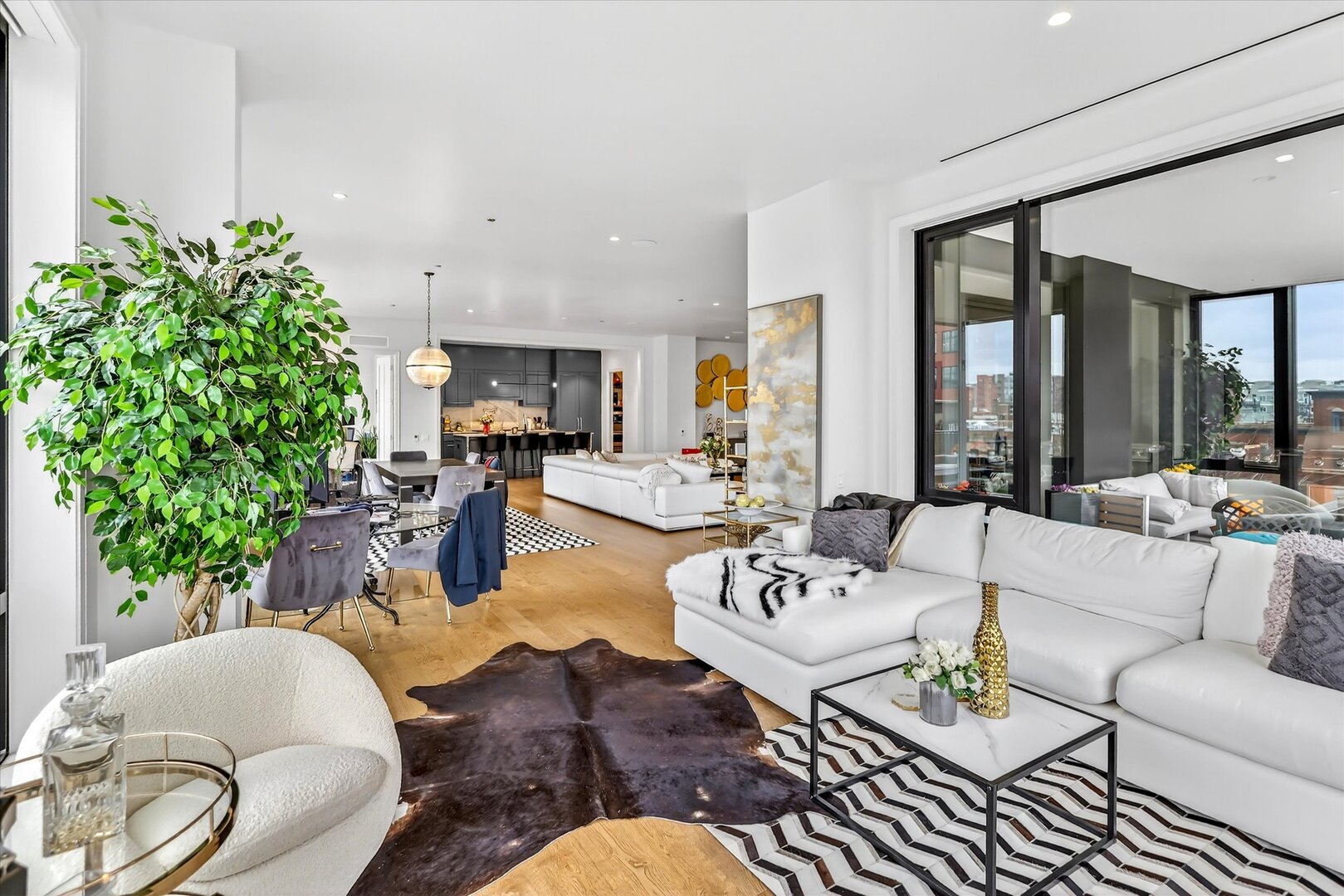 21 North May Street, Unit 501 Chicago, IL 60607 - Photo 22 of 82 a living room with furniture potted plant and a large window