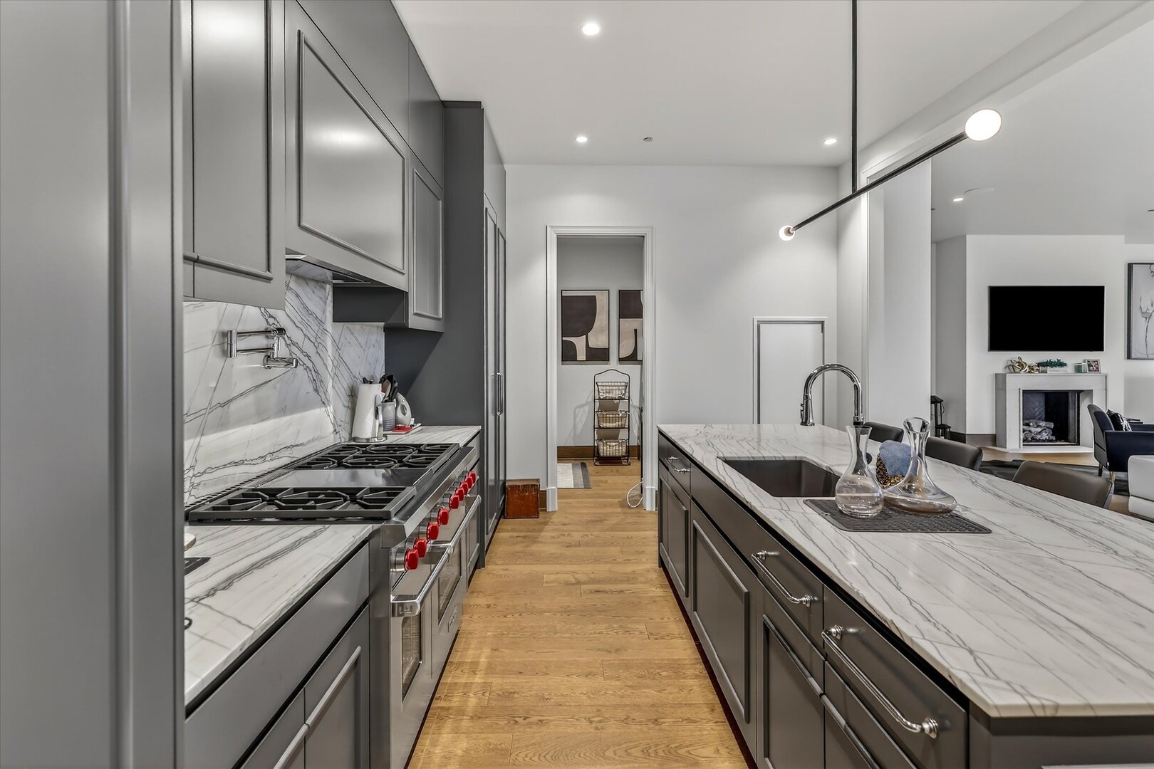 21 North May Street, Unit 501 Chicago, IL 60607 - Photo 27 of 82 a kitchen with stainless steel appliances a sink stove and refrigerator