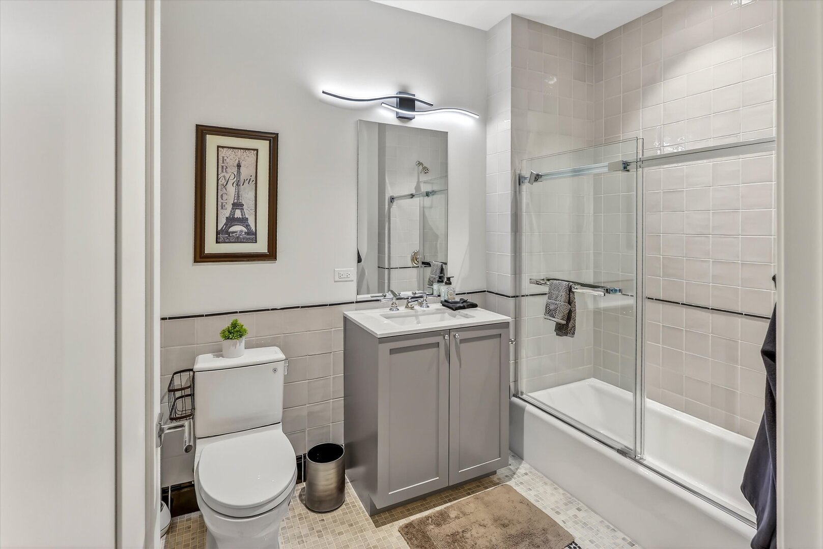 21 North May Street, Unit 501 Chicago, IL 60607 - Photo 39 of 82 a bathroom with a sink toilet and shower