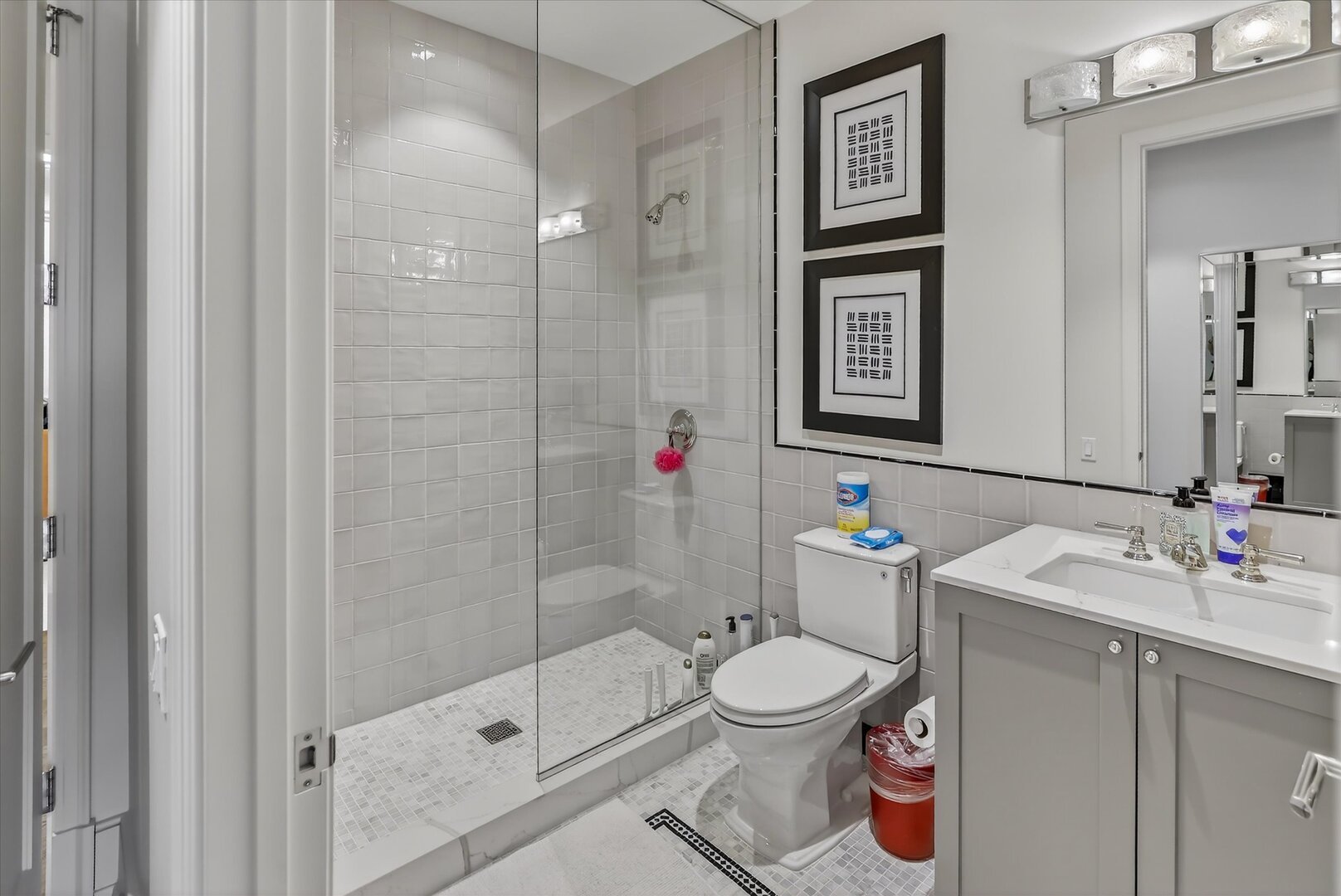 21 North May Street, Unit 501 Chicago, IL 60607 - Photo 43 of 82 a bathroom with a toilet sink and shower