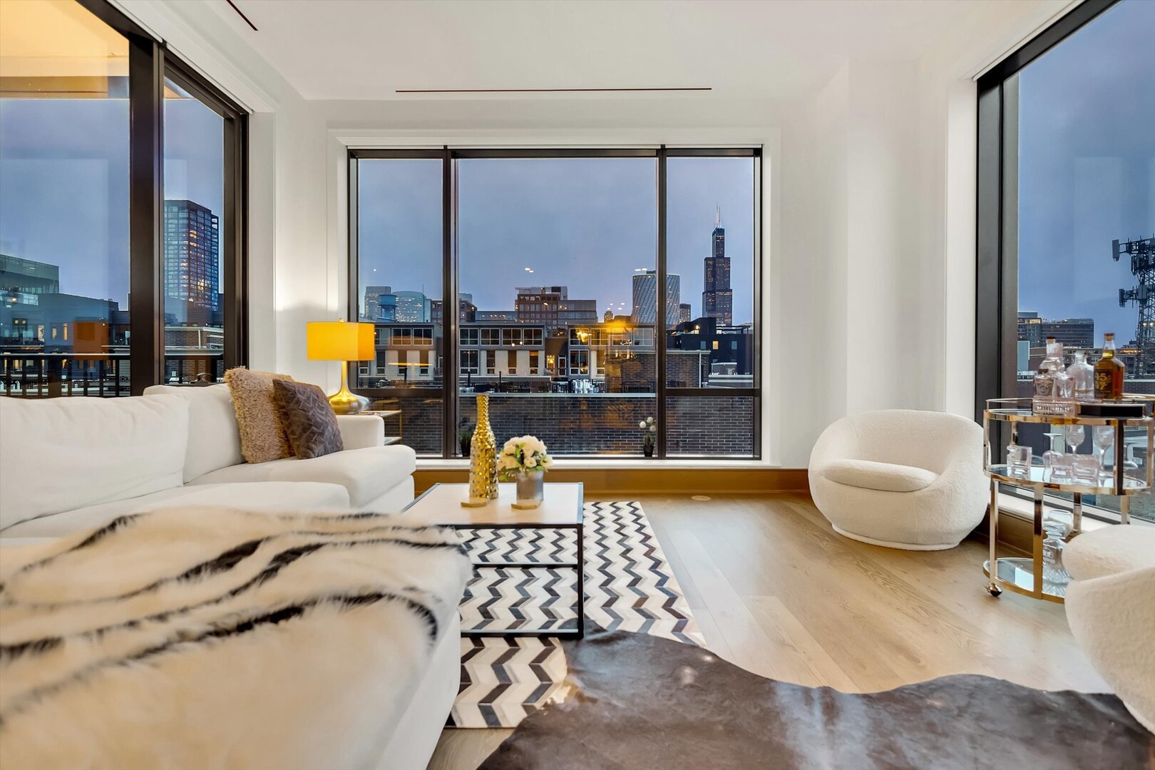21 North May Street, Unit 501 Chicago, IL 60607 - Photo 55 of 82 a living room with furniture and a large window