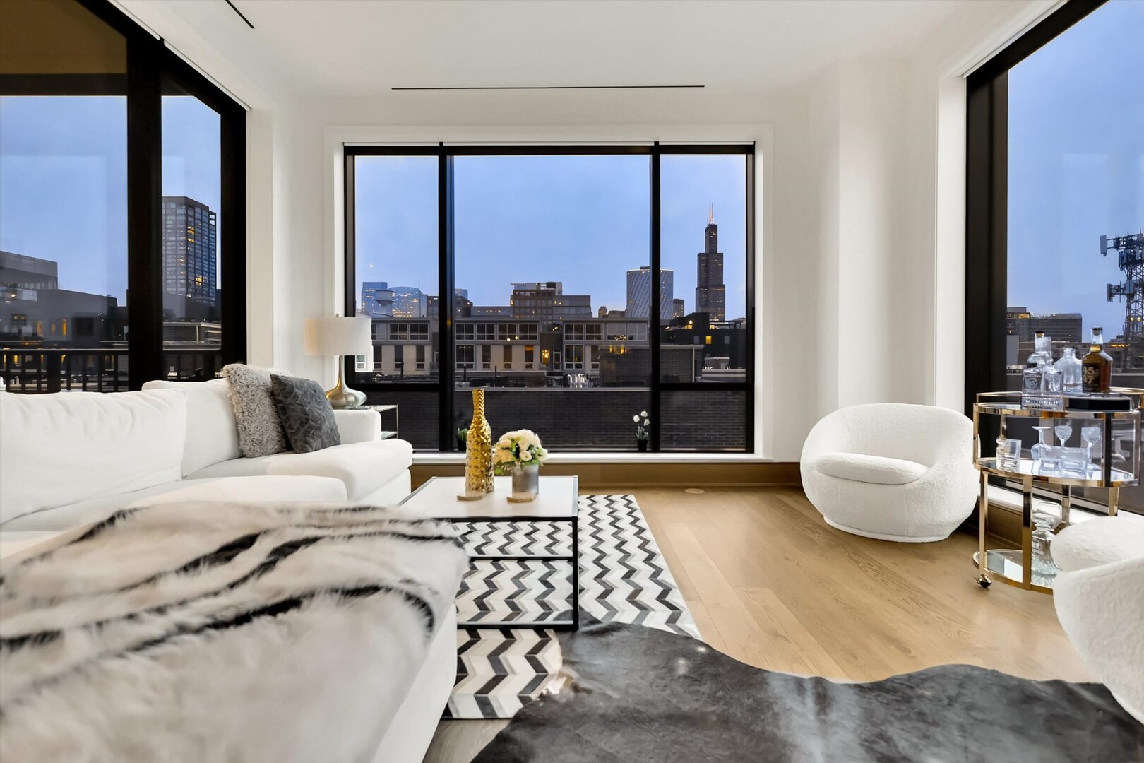 21 North May Street, Unit 501 Chicago, IL 60607 - Photo 56 of 82 a living room with furniture and a large window