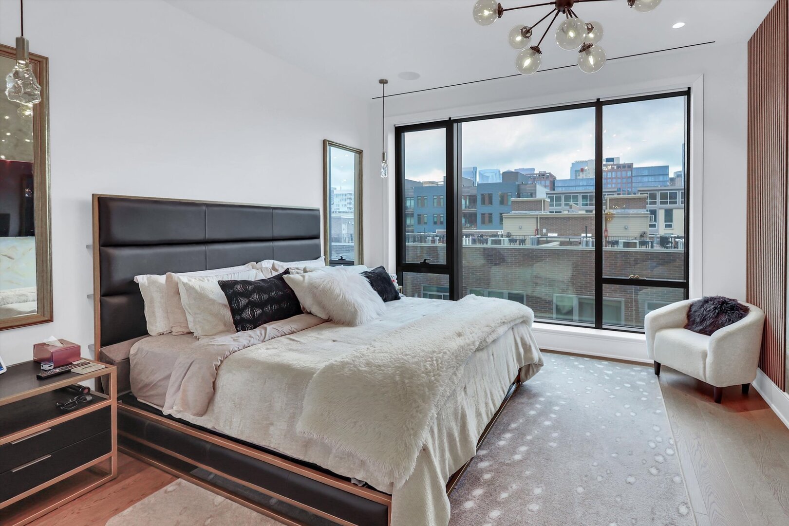 21 North May Street, Unit 501 Chicago, IL 60607 - Photo 66 of 82 a bedroom with a bed and a large window