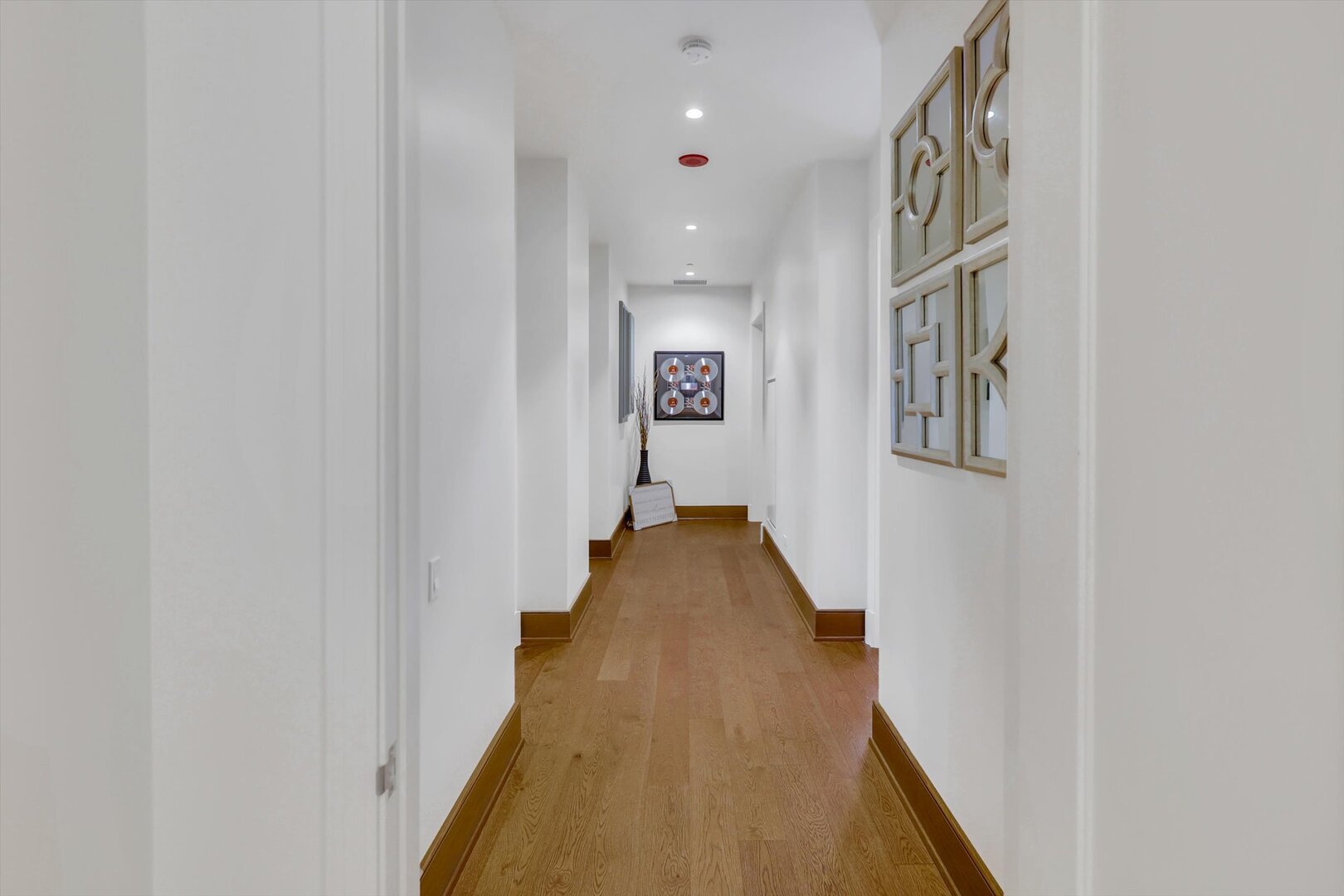21 North May Street, Unit 501 Chicago, IL 60607 - Photo 70 of 82 a view of a hallway with wooden floor and staircase
