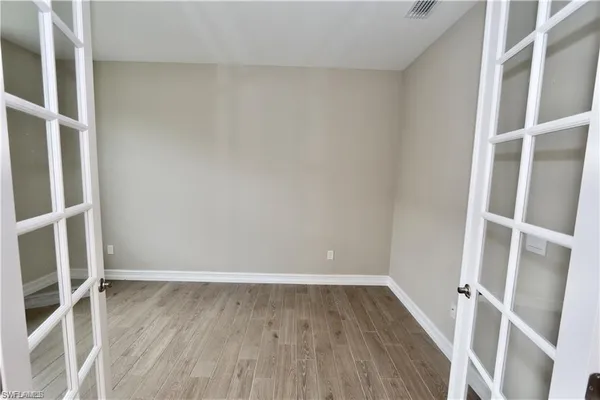 a view of an empty walk in closet