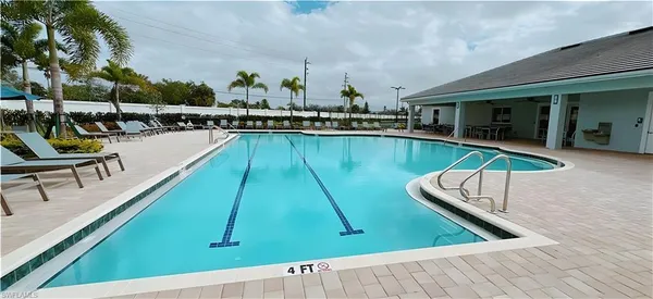 swimming pool with outdoor seating