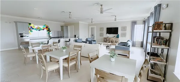 a living room with fireplace furniture and a flat screen tv