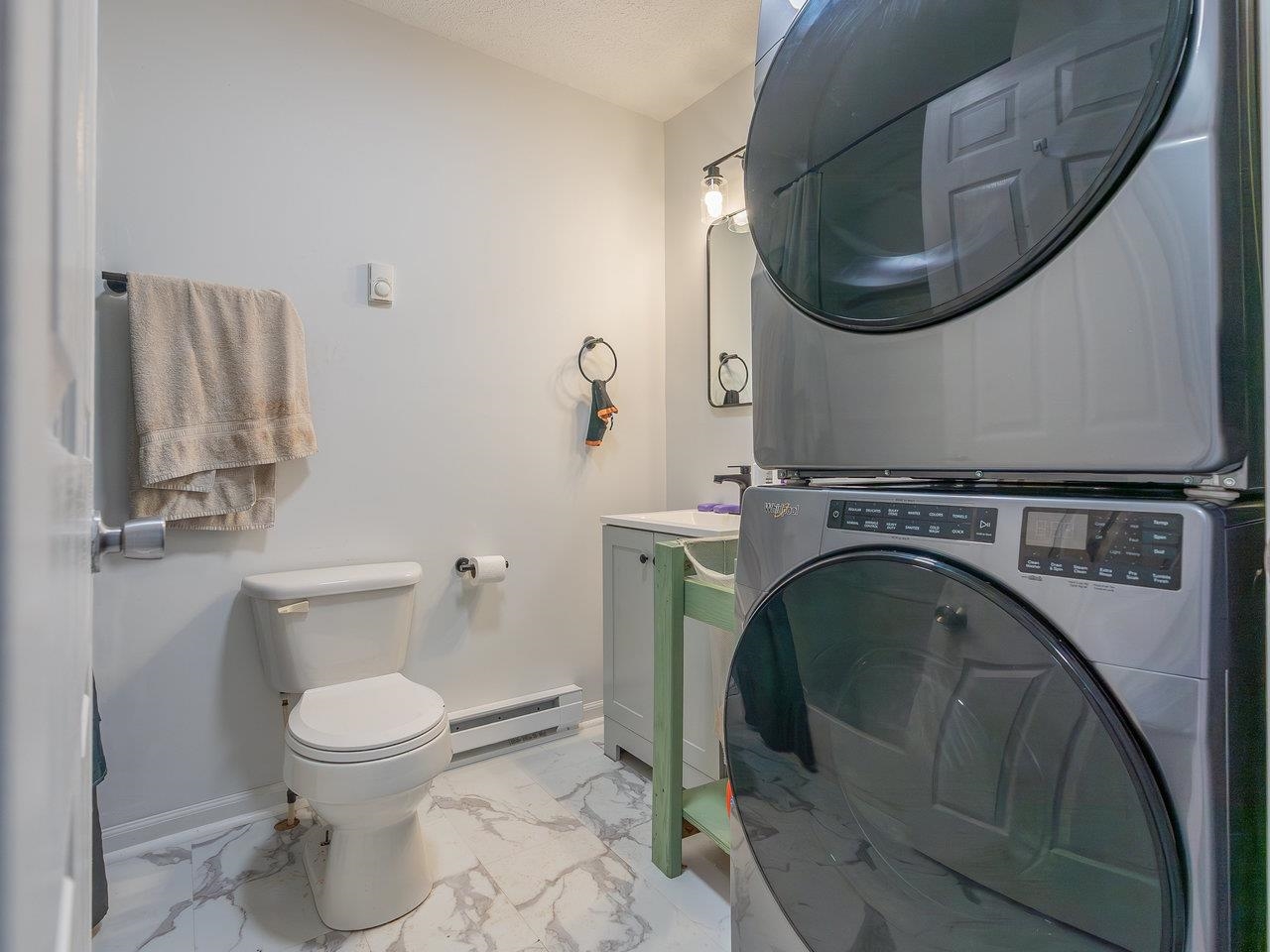 49 See Lane Mathias, WV 26812 - Photo 31 of 55 a bathroom with a toilet and a sink