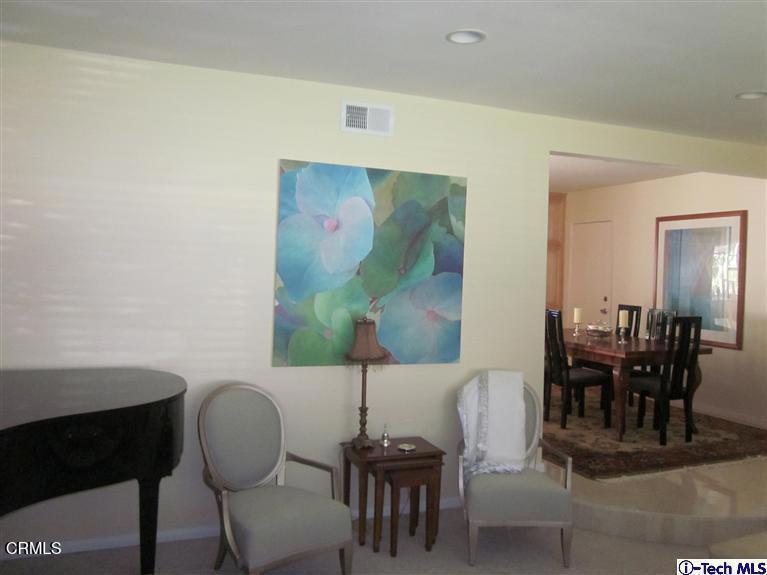 2716 Ridgepine Drive La Crescenta, CA 91214 - Photo 13 of 40 a dining room with furniture and wooden floor