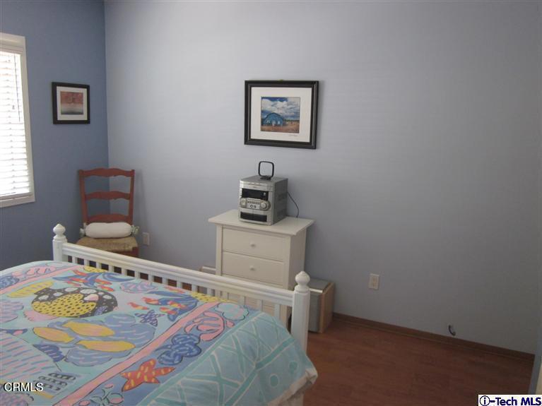 2716 Ridgepine Drive La Crescenta, CA 91214 - Photo 16 of 40 a bedroom with a bed and a window