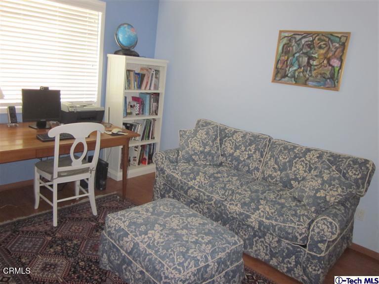 2716 Ridgepine Drive La Crescenta, CA 91214 - Photo 19 of 40 a living room with furniture a window and a table