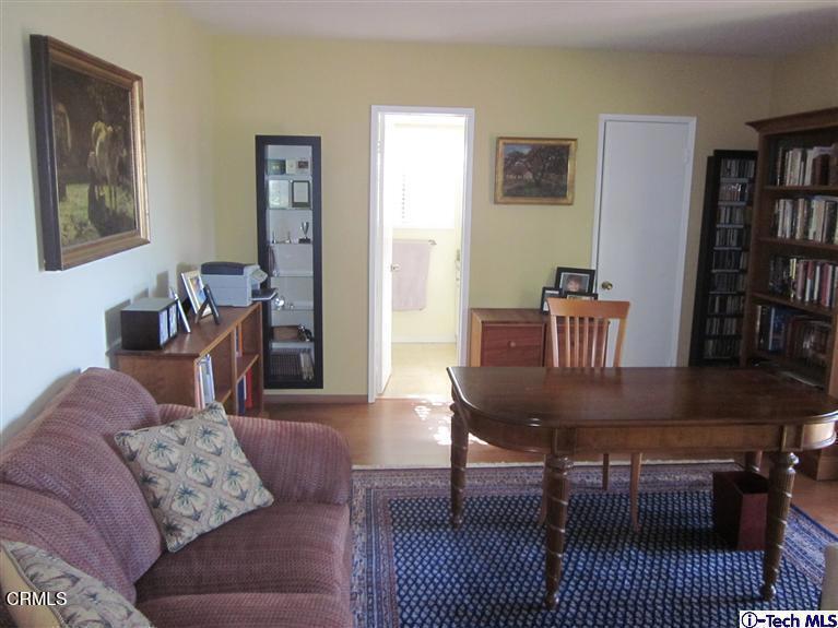 2716 Ridgepine Drive La Crescenta, CA 91214 - Photo 22 of 40 a living room with furniture and a rug