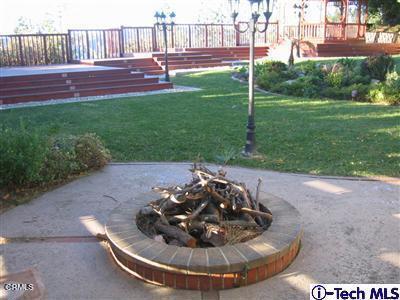 2716 Ridgepine Drive La Crescenta, CA 91214 - Photo 34 of 40 a view of a backyard with table and chairs