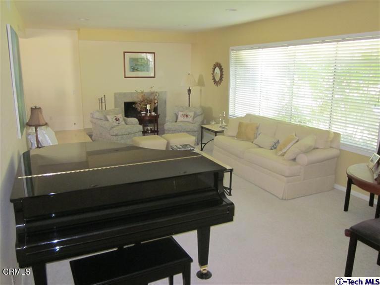 2716 Ridgepine Drive La Crescenta, CA 91214 - Photo 5 of 40 a bedroom with a bed and wooden floor