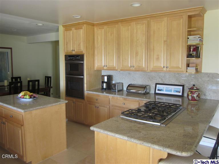 2716 Ridgepine Drive La Crescenta, CA 91214 - Photo 7 of 40 a kitchen with a stove and a refrigerator