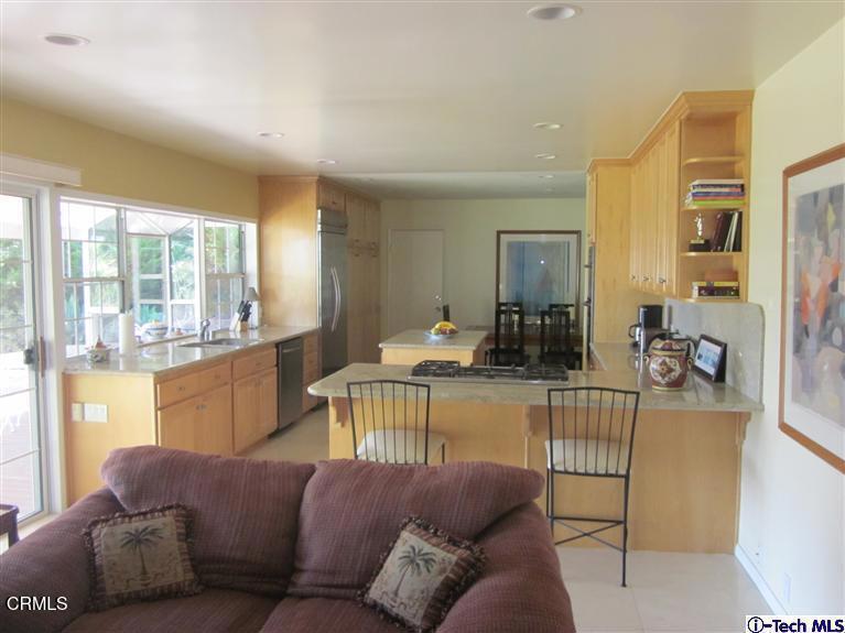 2716 Ridgepine Drive La Crescenta, CA 91214 - Photo 9 of 40 a living room with furniture and a large window