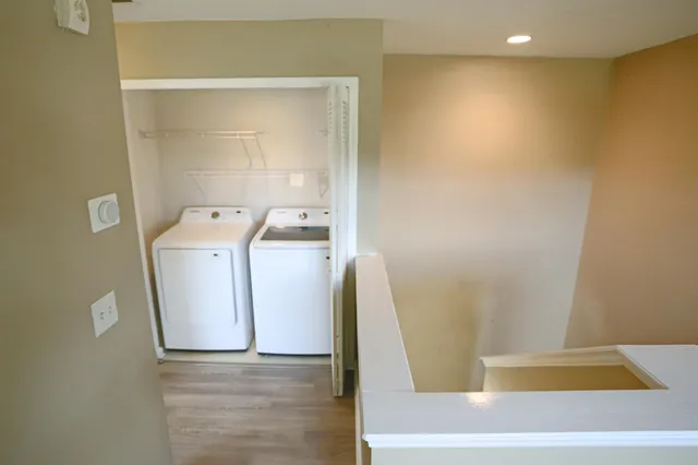 a view of bathroom with bathtub and shower