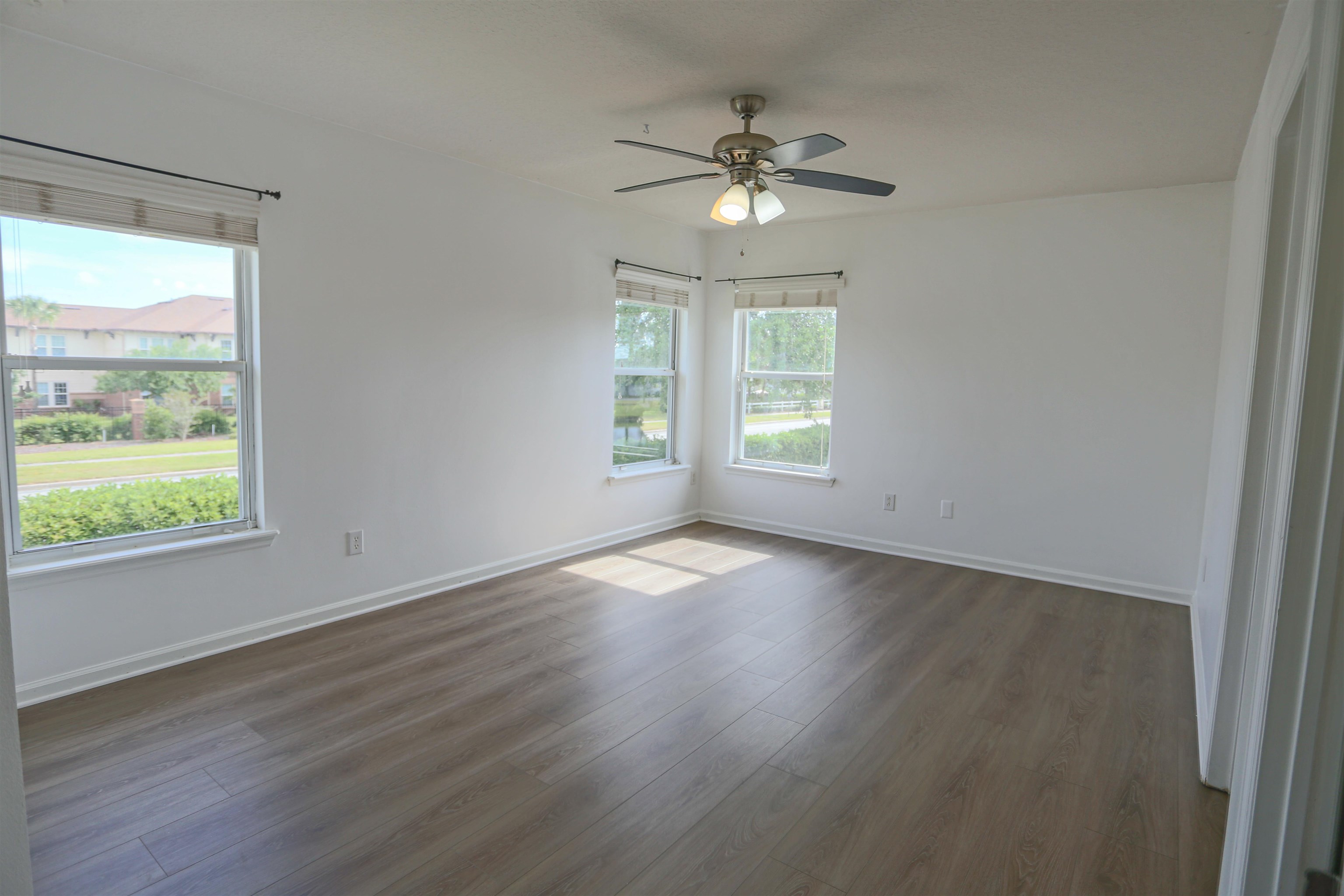 104 Crete Court St. Augustine, FL 32084 - Photo 19 of 32 a view of empty room with wooden floor and fan