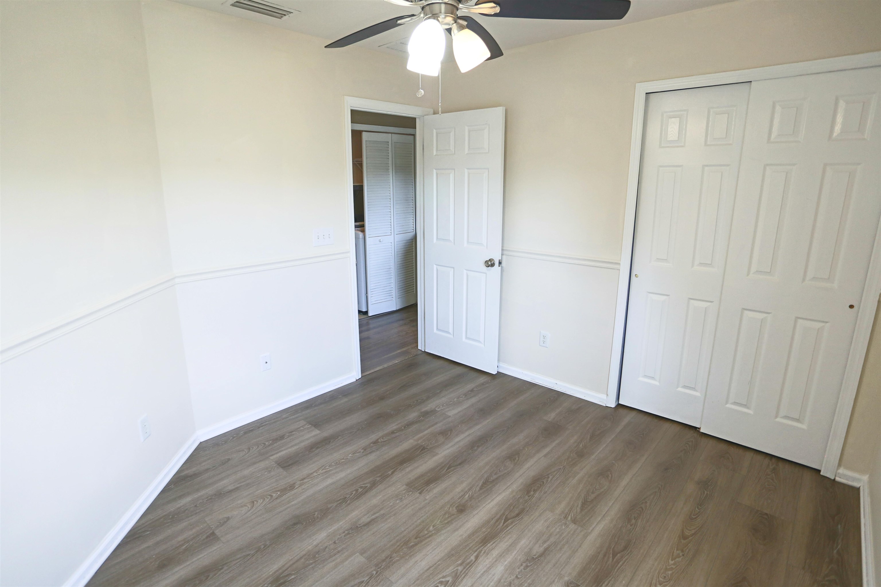 104 Crete Court St. Augustine, FL 32084 - Photo 30 of 32 a view of a room with wooden floor