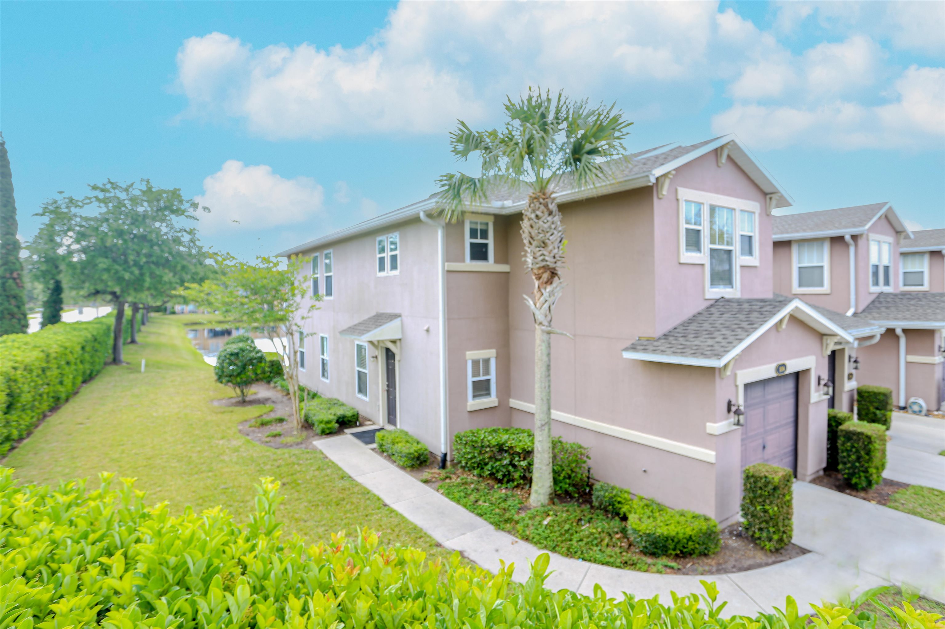 104 Crete Court St. Augustine, FL 32084 - Photo 4 of 32 a front view of a house with garden