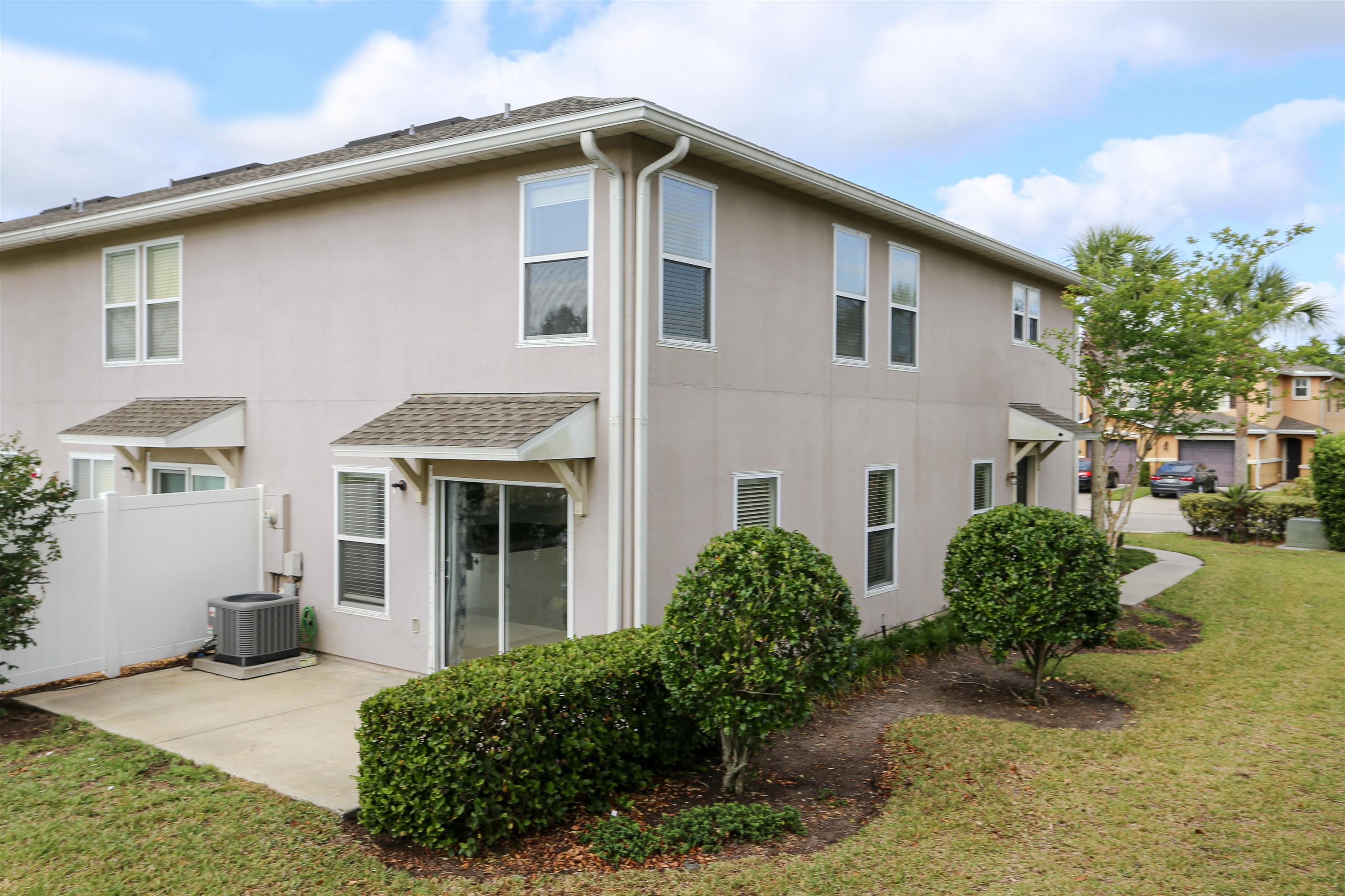 104 Crete Court St. Augustine, FL 32084 - Photo 5 of 32 a front view of a house with garden