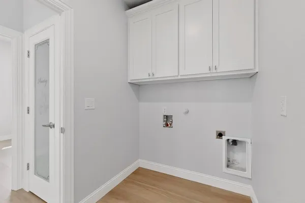 a view of small space with wooden floor