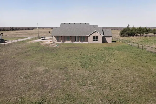 a house view with a lake view