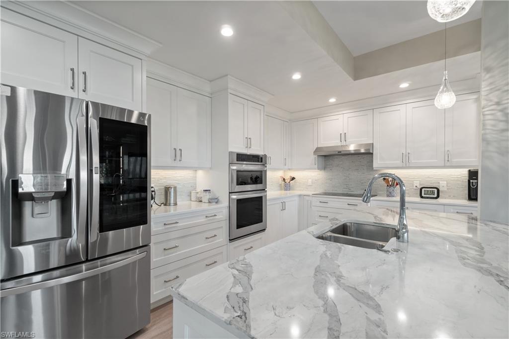 567 Audubon Boulevard, Unit D301 Naples, FL 34110 - Photo 8 of 37 Fabulous kitchen