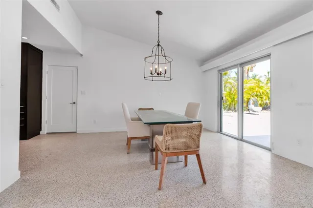 a kitchen with a sink cabinets and window