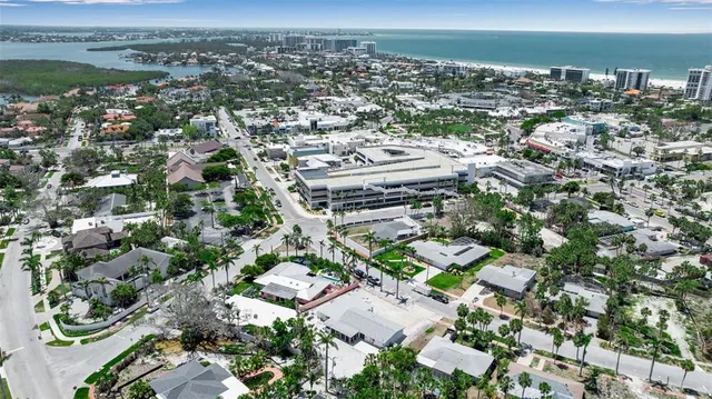 an aerial view of a house with outdoor space