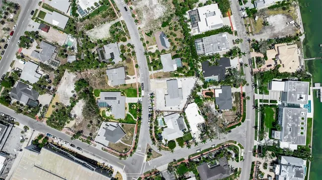 an aerial view of a house with outdoor space