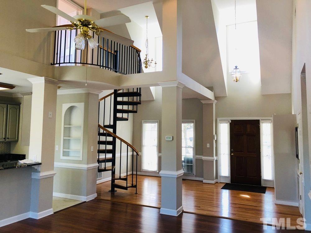 4309 Willow Lake Road Raleigh, NC 27616 - Photo 13 of 30 a view of an entryway with wooden floor and staircase