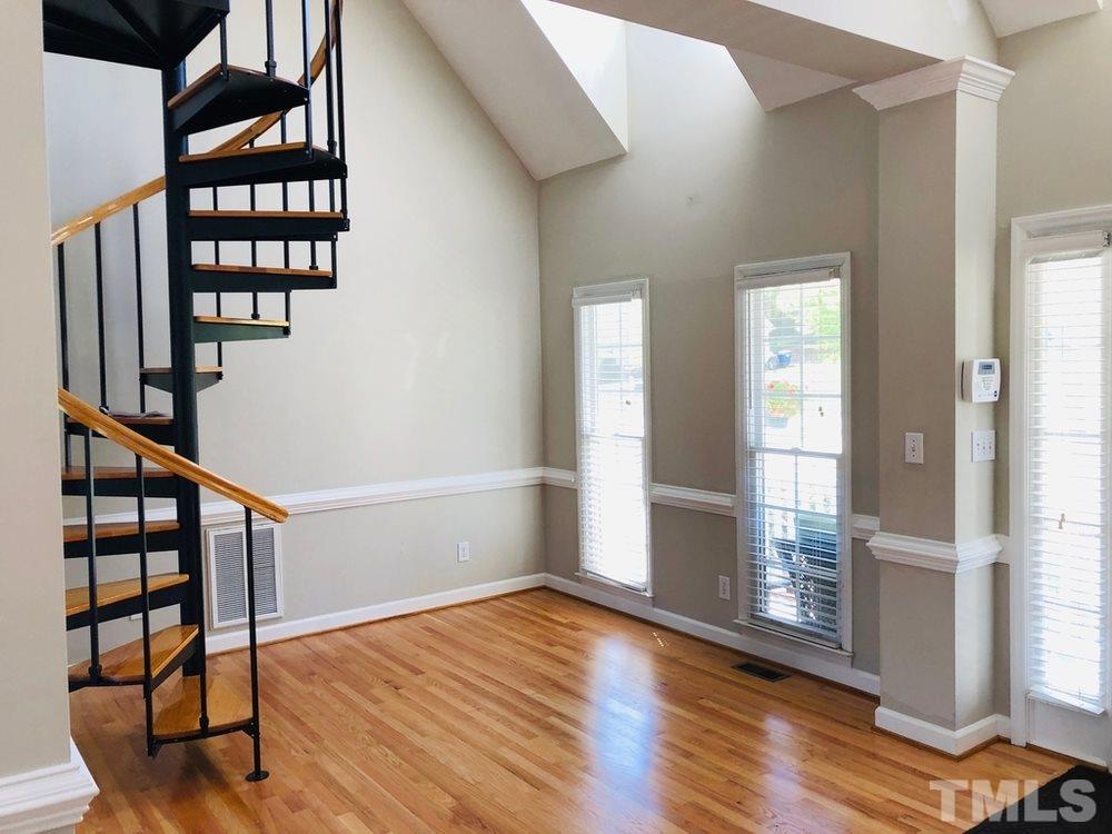 4309 Willow Lake Road Raleigh, NC 27616 - Photo 17 of 30 wooden floor in an empty room with a window