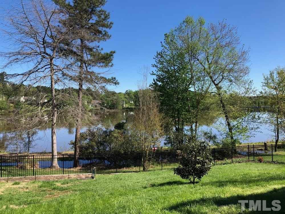 4309 Willow Lake Road Raleigh, NC 27616 - Photo 26 of 30 a view of a garden with a house in the background