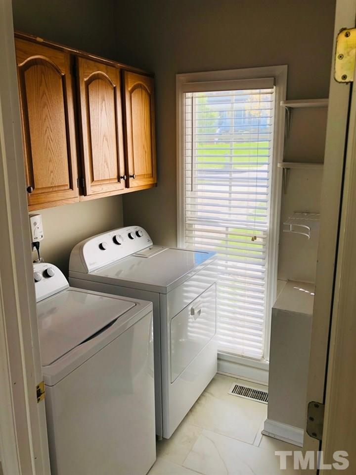 4309 Willow Lake Road Raleigh, NC 27616 - Photo 10 of 30 a utility room with dryer and washer