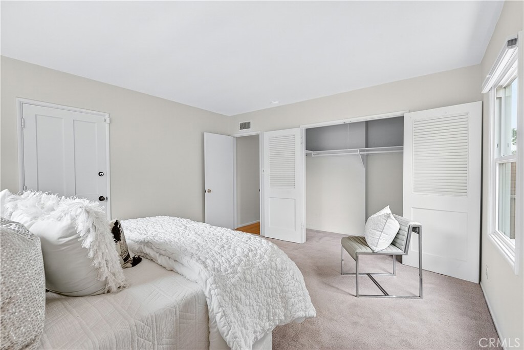 1005 West 20th Street Santa Ana, CA 92706 - Photo 16 of 28 Spacious closet in master bedroom with louvered doors